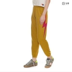 Aviator Nation Women’s Gold Sweatpants with Red Bolt